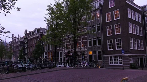 A young couple navigates with the map on a smartphone cellphone mobile phone Видео 86627027