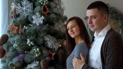 Young couple at the New Year tree Stock Footage 82532423