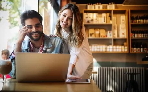 Young couple or college student using laptop computer notebook work together Stock Photos