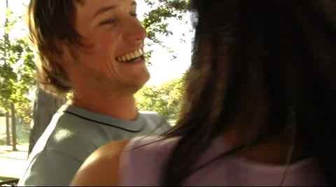 Young couple in park dancing Stock Footage 43683945