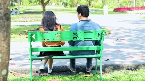Young couple in park having fun together. Stock Footage 92228809