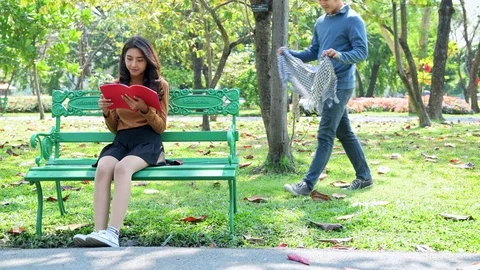 Young couple in park having fun together. Video stock 92235408