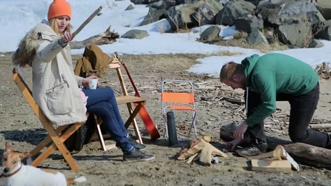 Young couple on a picnic. backpacking Видео 74953033