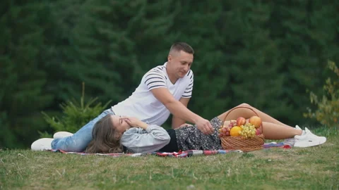 Young couple on a picnic Stock Footage 118990272