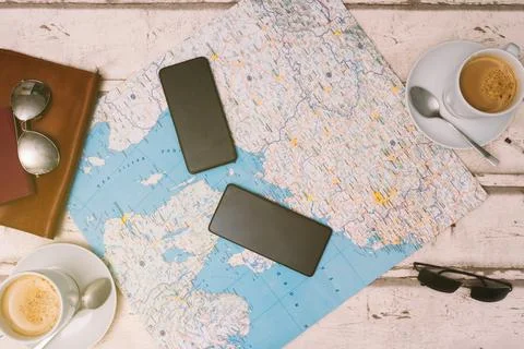Young couple planning a trip with a map. Holidays, honeymoon. Top view. planning Stock Photos