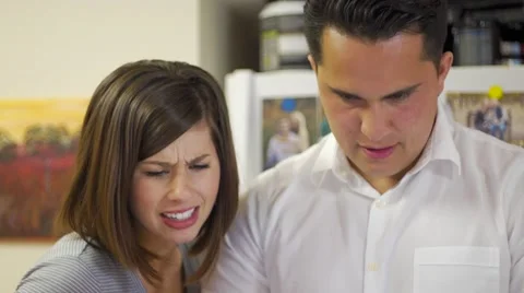 Young couple play on laptop computer Video stock 64336656