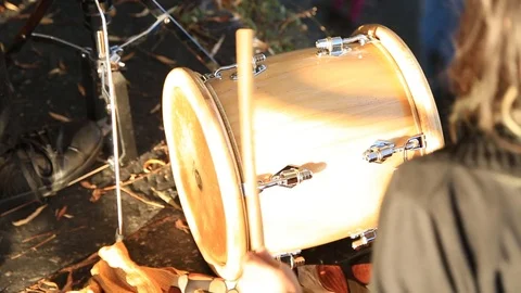 Young couple playing percussion instruments in the street, performance Stock Footage 120033795
