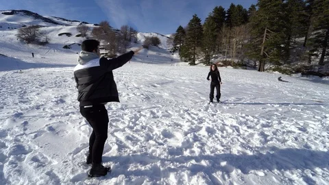 Young couple playing with snow Video stock 122315183