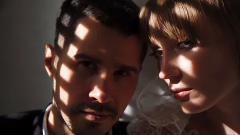 Young couple portrait, looking in the camera calmly, seriously. Glamour fashion Stock Footage 124520854