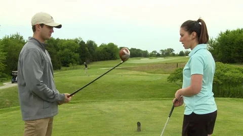 Young couple practice golf Stock Footage 74254871