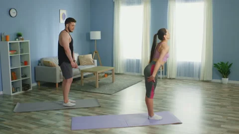Young Couple Practice Stretching Together at Home Stock Footage 132015090