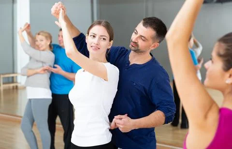 Young couple practicing active dance in pair Fotos Stock
