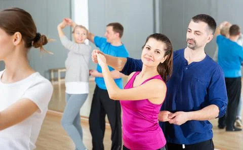 Young couple practicing active dance in pair Fotos Stock