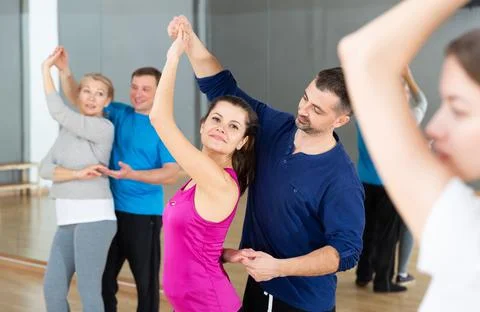 Young couple practicing active dance in pair Fotos Stock