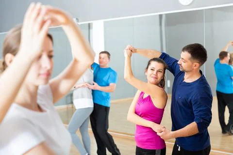 Young couple practicing active dance in pair Fotos Stock