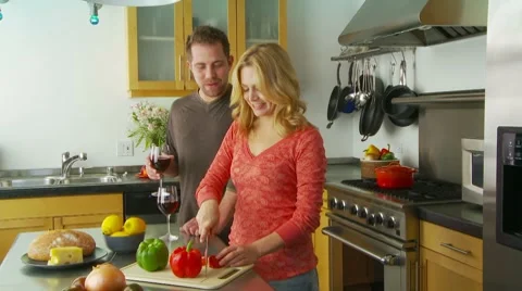 Young couple preparing food in kitchen Video stock 7729892