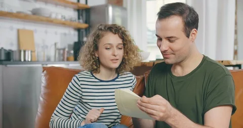 Young couple receiving positive answer Stock Footage 114120441