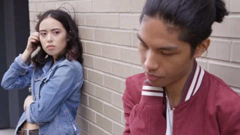 Young couple with relationship problems, girlfriend in focus. - Slow Motion - Stock Footage 125217564