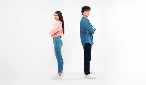 Young Couple With Relationship Problems Having Disagreement on White Background Stock Photos