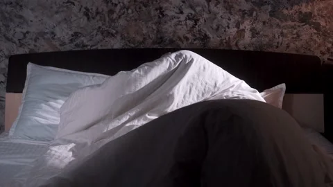 Young Couple Resting in Bed Stock Footage 133236125