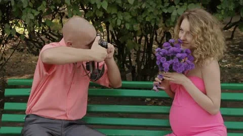 Young couple with a retro camera Stock Footage 14865338