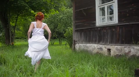 A young couple  running Stock Footage 64930501