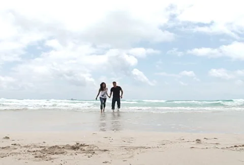 Young couple running in slow motion Stock Footage 1065455