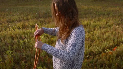 Young couple sets up a tent in a mountain forest at sunset. Stock-Footage 116943315