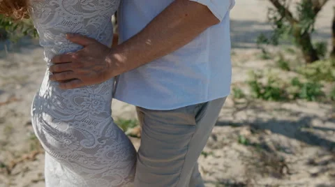 Young couple  in the shadow of the tree Stock Footage 51219355