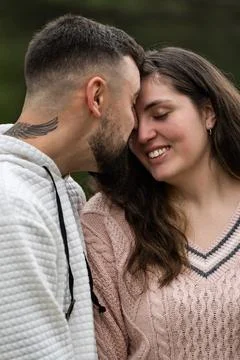 Young couple sharing intimate moment showing love and affection Stock Photos