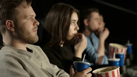 Young Couple Sharing Their Drink at the Movies 스톡 동영상 71778237