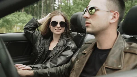 Young couple sitting in the cabriolet, close-up Video stock 172310285