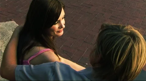 Young Couple sitting on steps Stock Footage 43685608