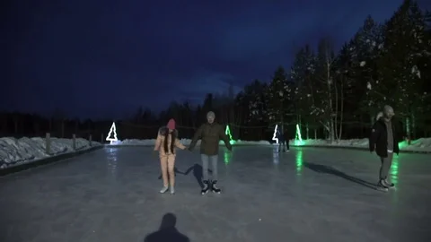 Young couple is skating and talking 스톡 동영상 79677477