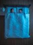 The young couple sleeping on the bed. night time. view from above Photo