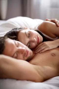 Young couple sleeping Stock Photos