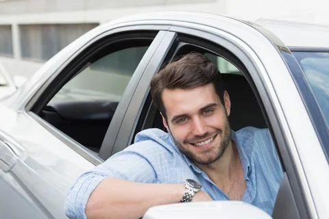 Young couple smiling at the camera Stock Photos