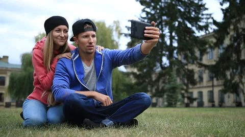 Young couple of students making selfie on tablet Video stock 68163713