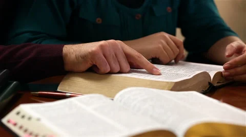 Young Couple Studying The Bible Stock Footage