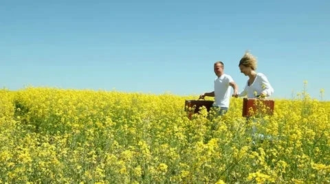 Young couple with suitcases Stock Footage 11128407