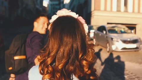 Young Couple On The Sunset Background Stockbeeldmateriaal 75161444