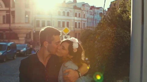 Young Couple On The Sunset Background Stockbeeldmateriaal 75161490