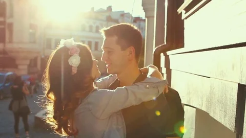 Young Couple On The Sunset Background Stockbeeldmateriaal 75161523