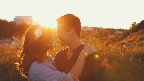Young Couple On The Sunset Background Stock Footage 75161607