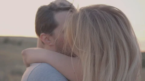 Young couple at sunset Stock Footage 87167729