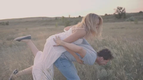 Young couple at sunset Stock Footage 87167747