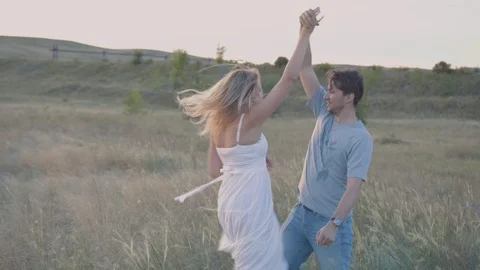 Young couple at sunset Stock Footage 87167754