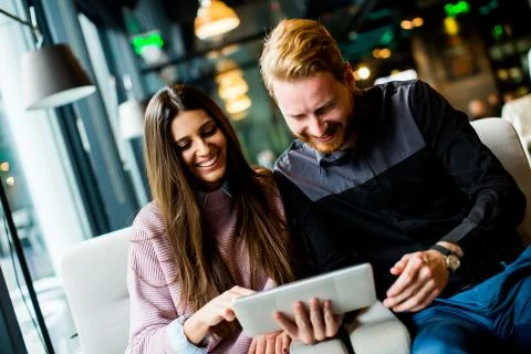 Young couple with tablet Stock Photos