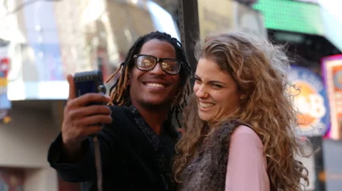 Young couple taking self portrait Video stock 62346099