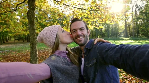 Young couple taking selfie in forest Stock Footage 57722957
